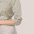 Sleeves can roll up and attach.
