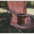 The sturdy steel frame provides stability, while wide armrests and a cup holder offer extra comfort.