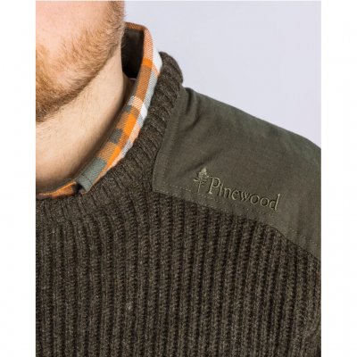 Ripstop fabric on shoulders and elbows.