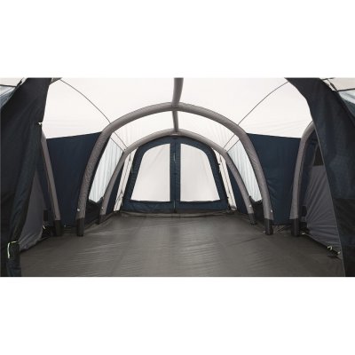 The tent has a very large living room with space for tables and chairs for 8 people.