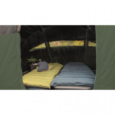 Darkend sleeping cabin with a D-shaped door and good ventilation on the family tent Outwell Elmdale 5PA.