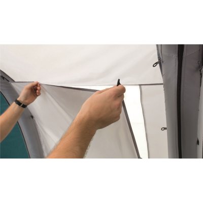 Curtains on all windows in the tent.