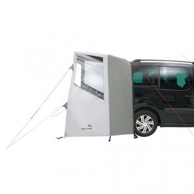 The tent is attached to the car with two tent lines.