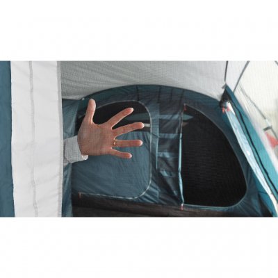 Mosquito net panels in the door between the tent's living room.