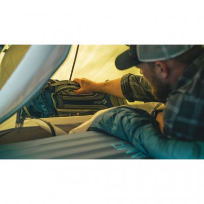 The tent has a storage compartment at the foot end.