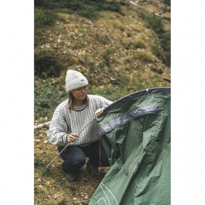 Integrated pole sleeves with closed ends and color-coded poles make the tent easy to pitch.