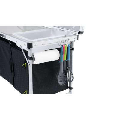 On the other short side there are storage options for household paper and kitchen utensils