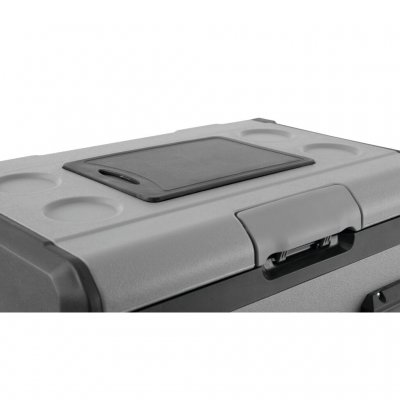 With the cutting board on the lid.