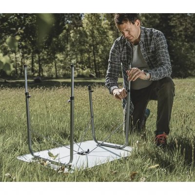 Easy Camp Alder camping table unfolds and folds down in just a few seconds.