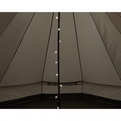 The light string creates a cozy atmosphere in the tent.