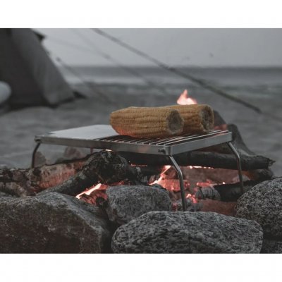 The grill stand works both as a grill and as a stand for pots and frying pans.