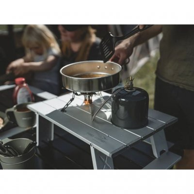 The table is perfect for cooking while camping or enjoying other outdoor activities.