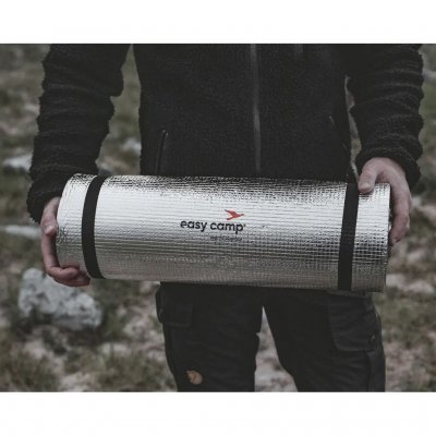 Elastic straps keep the mat neatly rolled up.