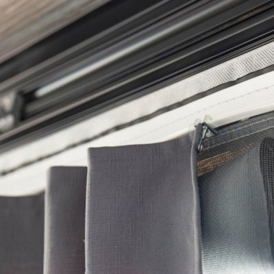 The attachment for the curtains makes them easy to move.