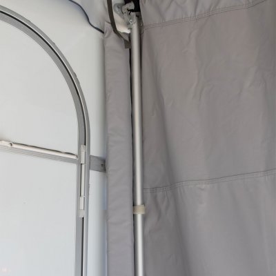 Pressure bar protects against wind and rain getting in between the side wall and the caravan