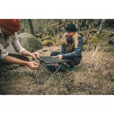 Low table that is perfect for small tents, day trips, the beach, or picnics, as it also works well to sit on the ground and eat