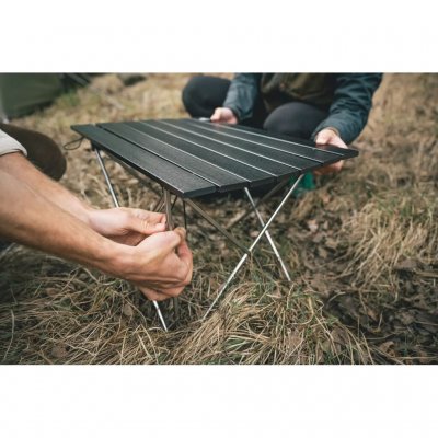 Foldable low table with a compact pack size.