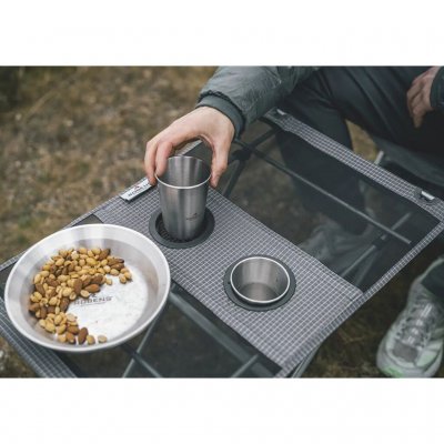 The table has two built-in cup holders.