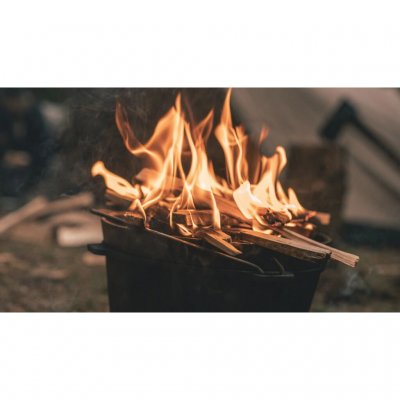 Cast iron pot that can be used over an open fire or in the oven.