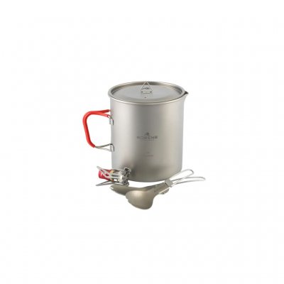 Compact cookware set in lightweight titanium for two people, including a pot with lid, two sporks and a gas burner that attaches