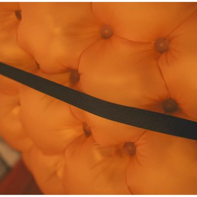 Elastic strap to secure the pillow to the sleeping mat