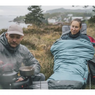 The sleeping bag uses double layers of insulation which, combined with the body-shaped construction, provide good insulation wit