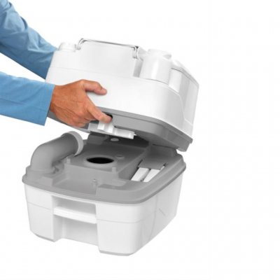 The waste tank is removed by opening the lock on the back.