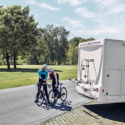 Bicycle holder for mounting on the back of a mobile home.
