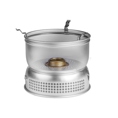 The alcohol burner is placed in the lower windbreak of the storm kitchen.